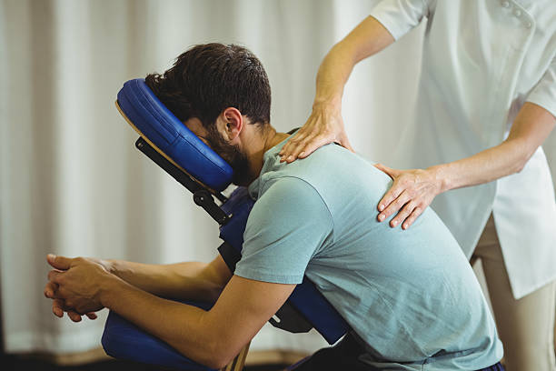 Séance de Shiatsu sur chaise en entreprise